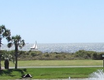 golf and ocean at Oak Island and Caswell Beach NC